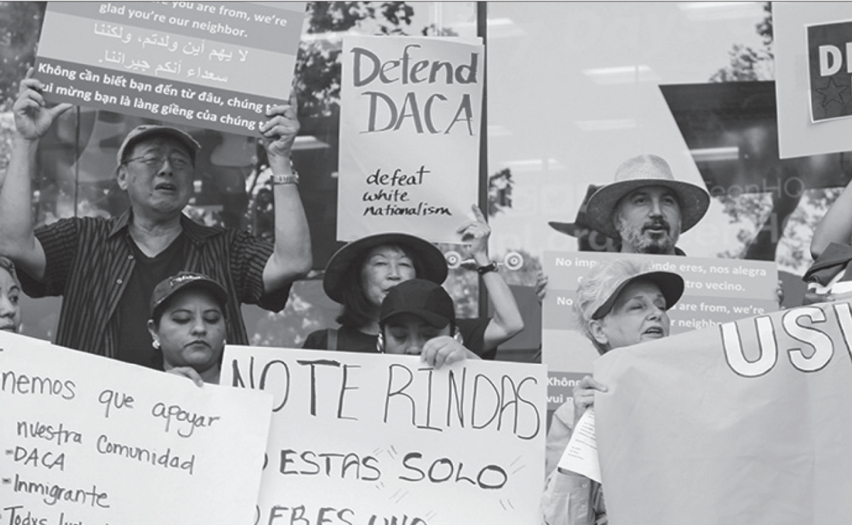 In 2017, activists wave signs in San Jos&#233; to support those affected by the first Trump administration's decision to end Deferred Action for Childhood Arrivals (DACA).